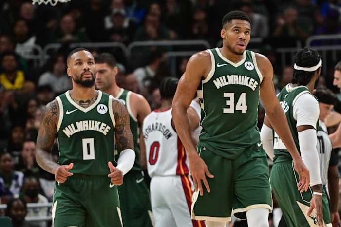 Milwaukee Bucks forward Giannis Antetokounmpo (34) and guard Damian Lillard (0)
